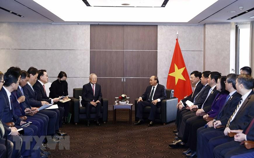 Chủ tịch nước Nguyễn Xuân Phúc tiếp ông Sohn Kyung Sik, Chủ tịch Tập đoàn CJ. (Ảnh: Thống Nhất/TTXVN)