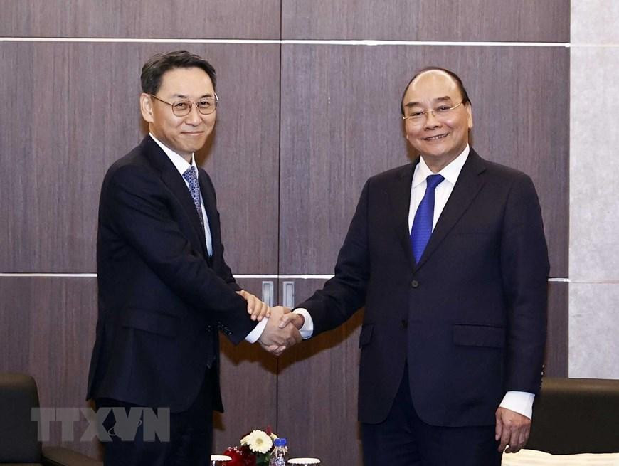 Chủ tịch nước Nguyễn Xuân Phúc tiếp ông Yeonin Jung, Giám đốc điều hành, Chủ tịch Tập đoàn Doosan Enerbility. (Ảnh: Thống Nhất/TTXVN)