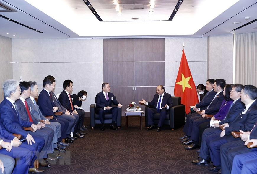 Chủ tịch nước Nguyễn Xuân Phúc tiếp Nhóm doanh nghiệp đối tác Đất Việt/Kocham. (Ảnh: Thống Nhất/TTXVN)