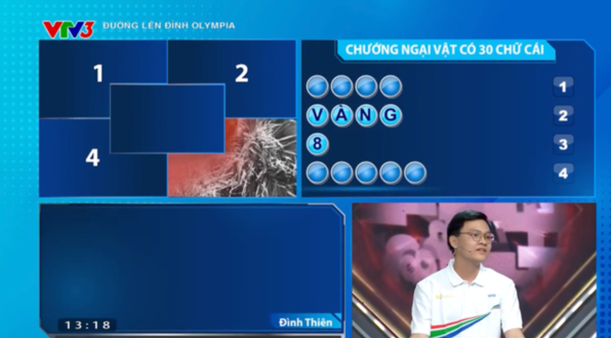 Đình Thiên vô cùng tự tin khi bấm chuông giành quyền trả lời chướng ngại vật. Đình Thiên vô cùng tự tin khi bấm chuông giành quyền trả lời chướng ngại vật.