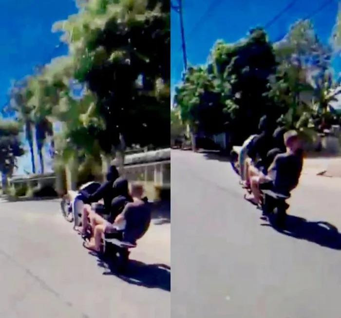 Video ba thanh niên ngồi trên xe máy "bốc đầu" trên mạng xã hội. Video ba thanh niên ngồi trên xe máy "bốc đầu" trên mạng xã hội.