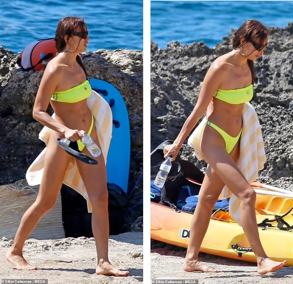 Một ngày sau đó (4/8), Irina thay sang bộ bikini màu xanh neon đi tắm biển.