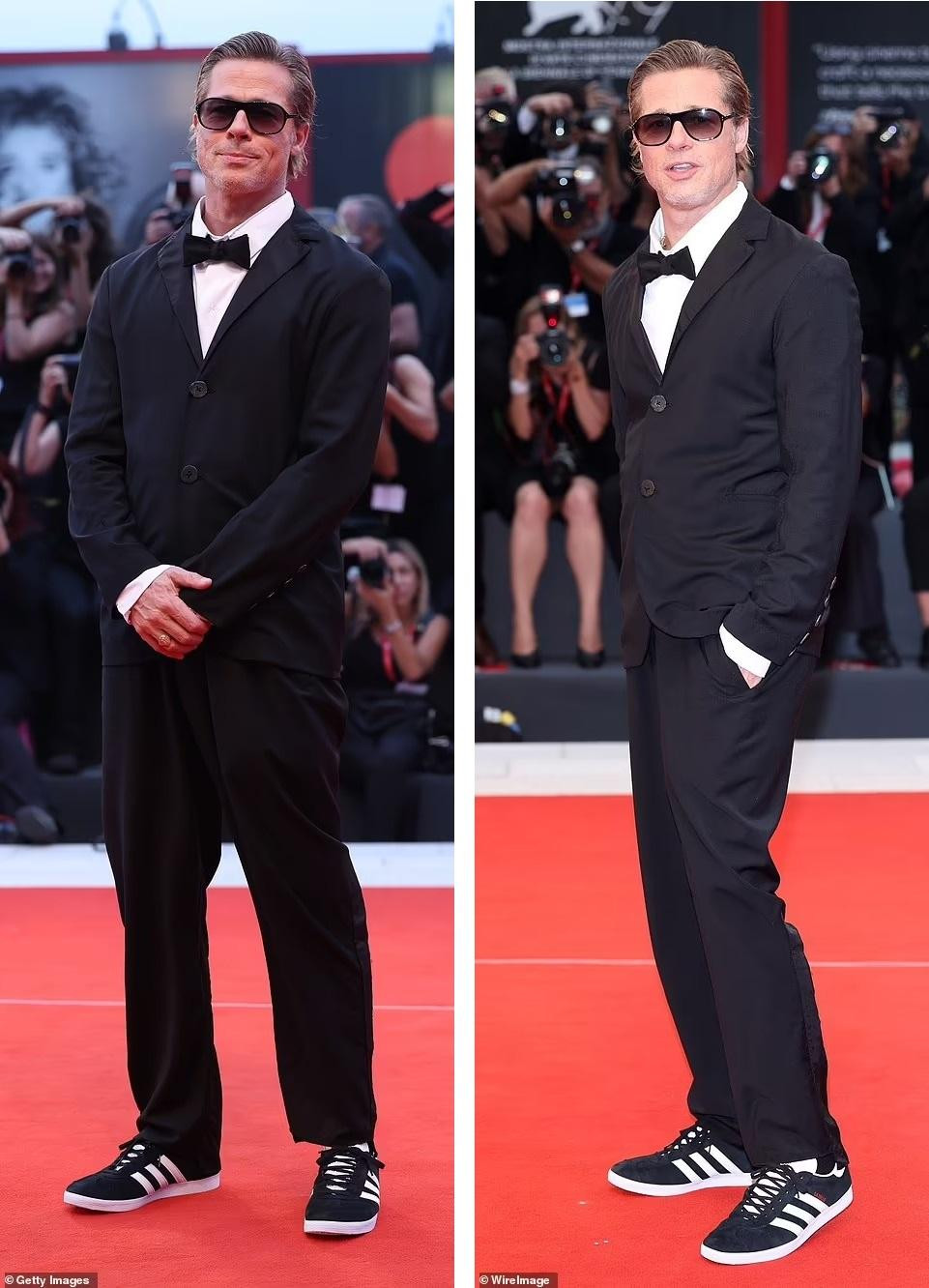 Brad Pitt gây bất ngờ khi tham gia sự kiện. Anh đến với vai trò nhà sản xuất của phim. Tài tử sinh năm 1963 trông trẻ trung hơn khi phối lễ phục đen truyền thống với giày thể thao đồng bộ.