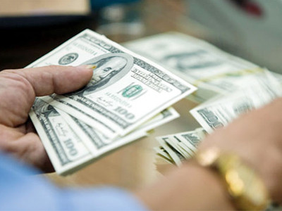 Bối cảnh đợt điều chỉnh tỷ giá lần này diễn ra trong thời điểm rất nhạy cảm - Ảnh: SGTT