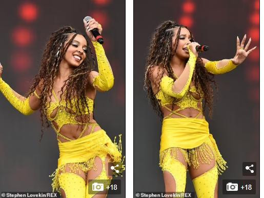 Tinashe sở hữu vẻ đẹp hoang dại cực "bốc lửa" với mái tóc xoăn xù, gương mặt với những đường nét xinh đẹp và body nóng bỏng nảy nở dù chỉ cao 1m65. Cô quyến rũ nổi bật, biểu diễn hết mình trên sân khấu.