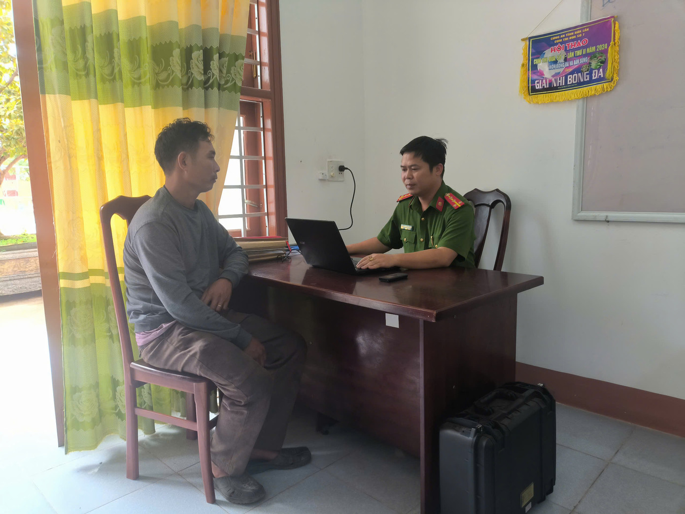 Ông Hồ Văn Định tại cơ quan công an Ông Hồ Văn Định tại cơ quan công an