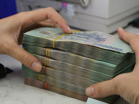 Lợi nhuận ngân hàng không còn “hoành tráng” như xưa. ảnh: PV