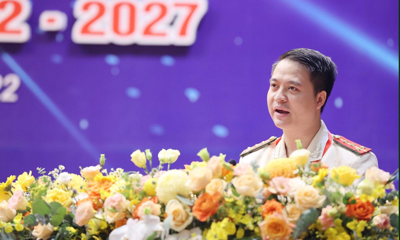 Anh Trần Văn Tân trình bày báo cáo thẩm tra tư cách đại biểu dự Đại hội. Ảnh: Như Ý