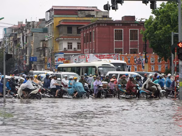 Ngập lụt trong mùa mưa tại Hà Nội Ảnh: Nguyễn Tú