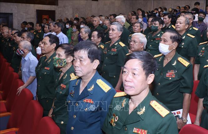 Các cựu chiến binh, quân tình nguyện, chuyên gia Việt Nam từng chiến đấu và công tác tại Lào dự lễ kỷ niệm 60 năm Ngày thiết lập quan hệ ngoại giao Việt Nam - Lào, sáng 18/7/2022 tại Thủ đô Hà Nội. Ảnh: Lâm Khánh/TTXVN.