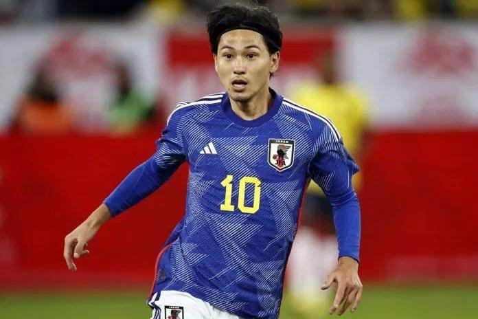 Takumi Minamino lần đầu cùng tuyển Nhật Bản tham dự World Cup 2022 tại Qatar. Anh từng được gọi là thần đồng bóng đá Nhật Bản và đang thi đấu ở vị trí tiền vệ, tiền đạo cho câu lạc bộ Monaco tại Ligue 1. Ảnh: Getty.