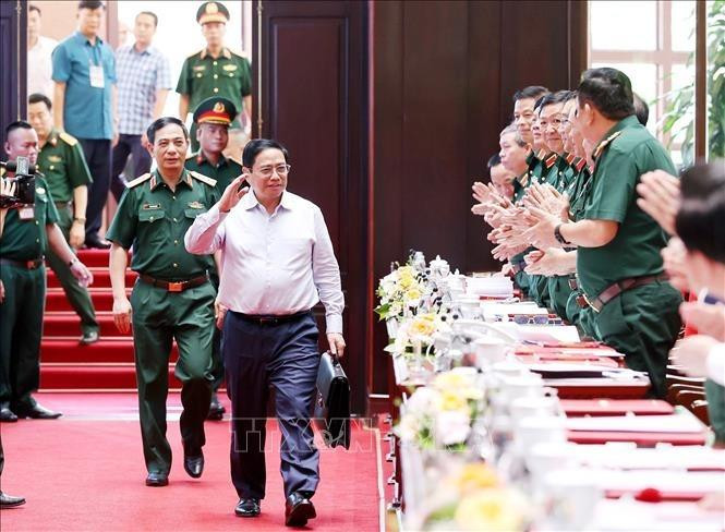 Thủ tướng Phạm Minh Chính tới dự hội nghị. Ảnh: Dương Giang/TTXVN