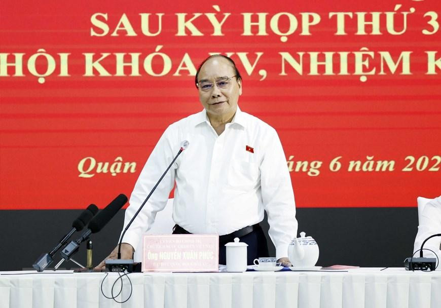 Chủ tịch nước Nguyễn Xuân Phúc phát biểu tại buổi tiếp xúc cử tri. (Ảnh: Thống Nhất/TTXVN)