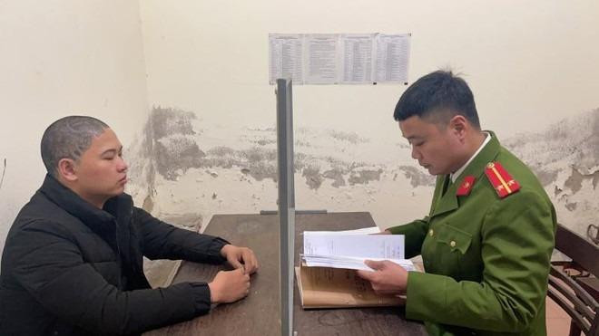 Nguyễn Đình Quân tại cơ quan công an.