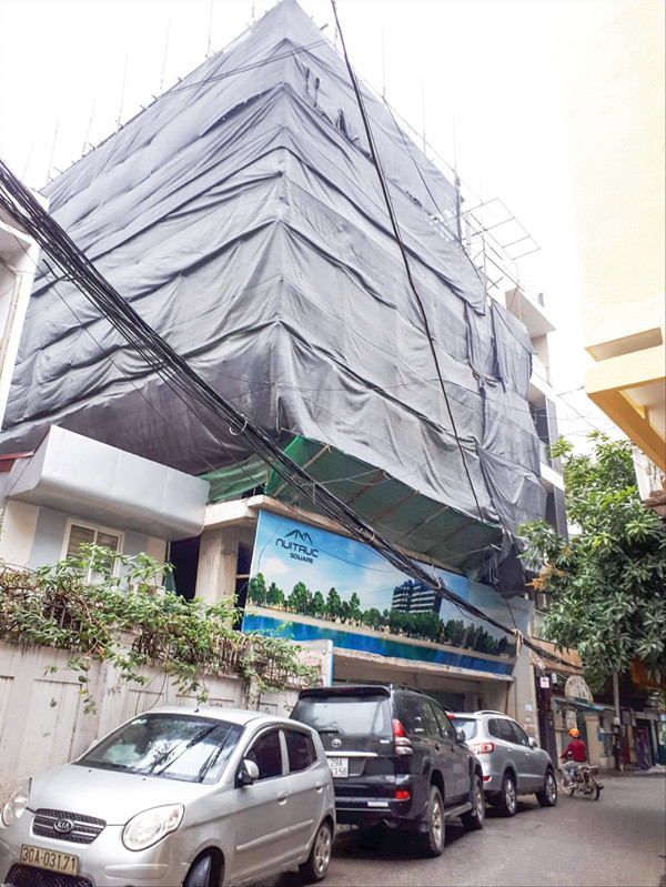 Loạn thị trường bán nhà trên giấy ảnh 1