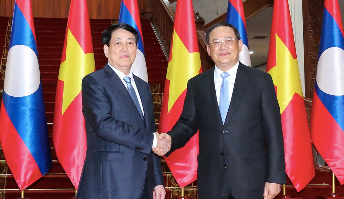 Chủ tịch nước Lương Cường và Thủ tướng Lào Sonexay Siphandone. Ảnh: Nhandan