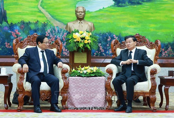 Thủ tướng Phạm Minh Chính trong cuộc gặp Tổng Bí thư, Chủ tịch nước Thongloun Sisoulith. (Ảnh: TTXVN)