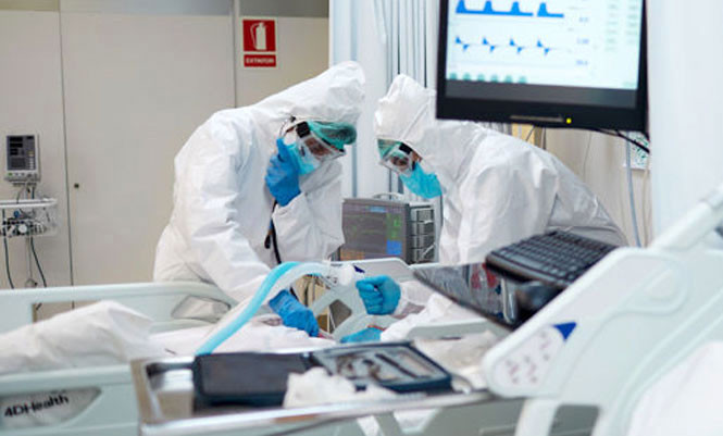 Bổ sung bệnh COVID-19 vào danh mục bệnh nghề nghiệp được hưởng BHXH. Ảnh minh họa. Bổ sung bệnh COVID-19 vào danh mục bệnh nghề nghiệp được hưởng BHXH. Ảnh minh họa.
