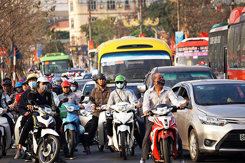 Cửa ngõ nam Hà Nội 'tê liệt' chiều mùng 5 Tết ảnh 7