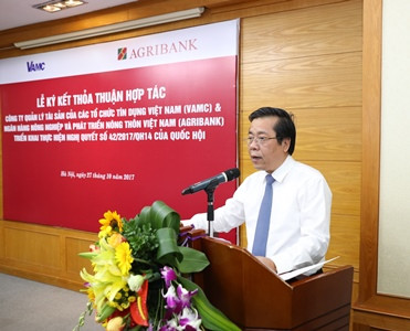 Agribank và VAMC ký kết thỏa thuận hợp tác về xử lý nợ xấu ảnh 1