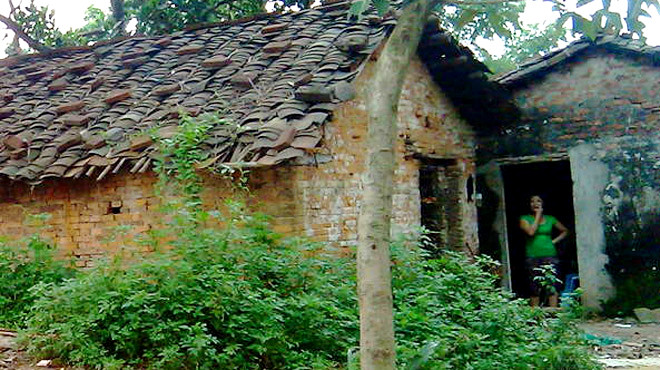 Những cô gái Việt buộc phải “hành nghề” trong những khu nhà tồi tàn như thế này ở Xám Cáo. Ảnh: Quốc Việt Những cô gái Việt buộc phải “hành nghề” trong những khu nhà tồi tàn như thế này ở Xám Cáo