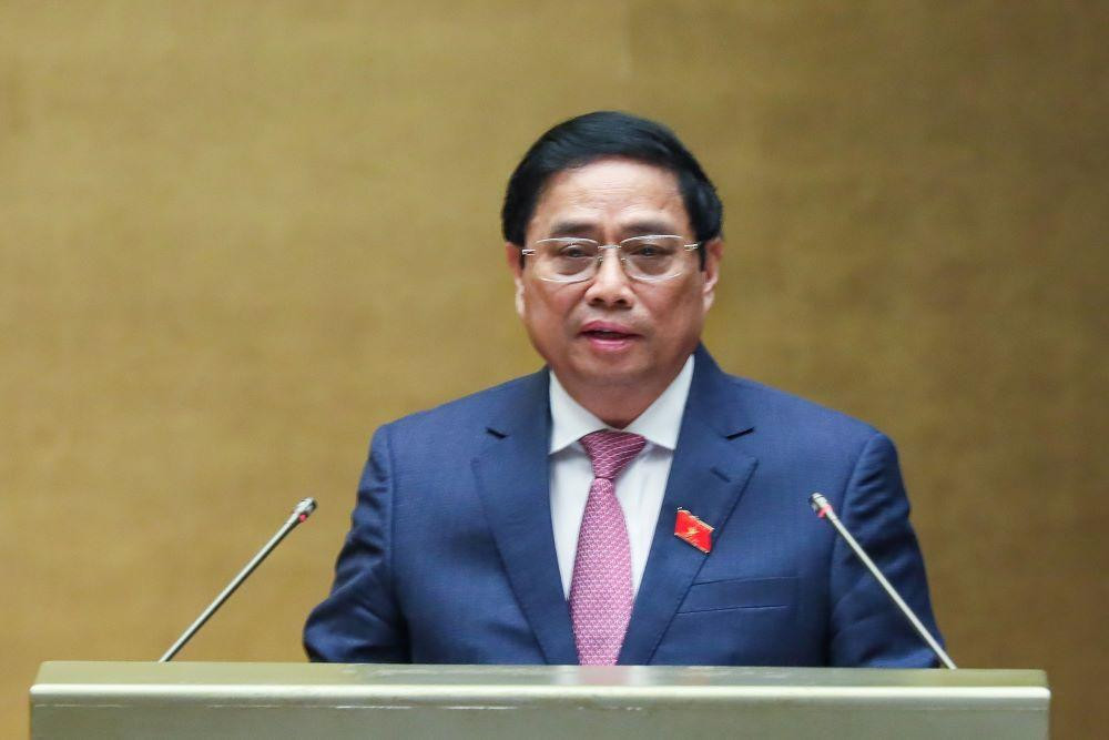 Thủ tướng Phạm Minh Chính trình bày báo cáo kinh tế, xã hội trong phiên khai mạc Thủ tướng Phạm Minh Chính trình bày báo cáo kinh tế, xã hội trong phiên khai mạc