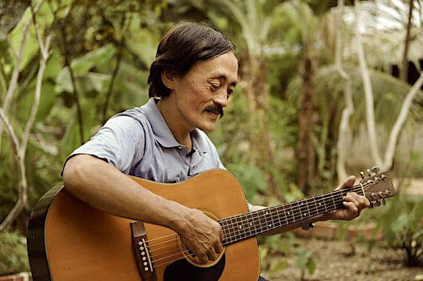 Giang Còi muốn về bên kia thế giới cùng cây đàn guitar (Ảnh: Internet)
