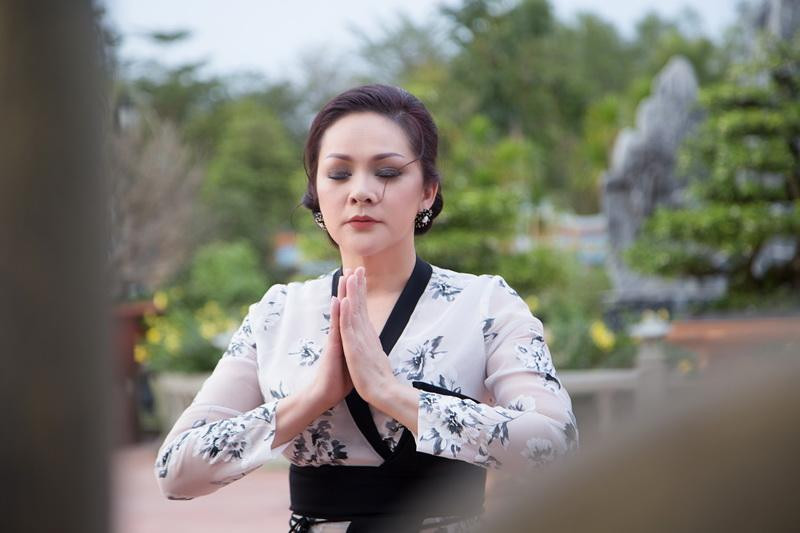 Chiếc áo dài Như Quỳnh trong thời gian mới về nước biểu diễn (Ảnh: Internet)