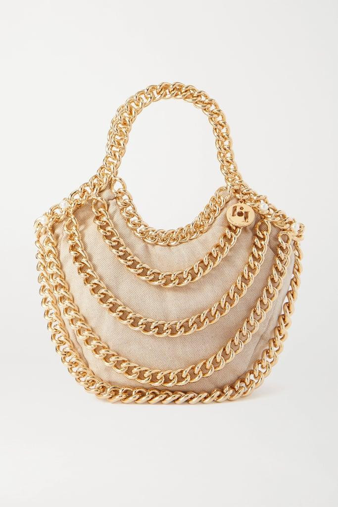 Với chiếc túi này bạn nên mặc đồ càng tối giản càng tốt.