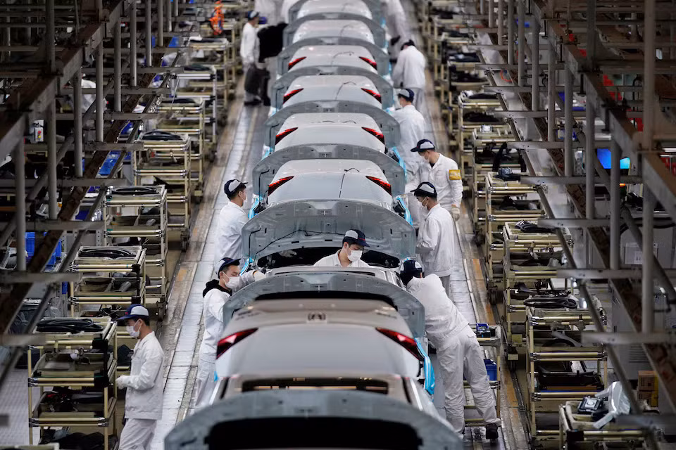 Dây chuyền sản xuất bên trong nhà máy của liên doanh Dongfeng Honda tại Trung Quốc. Ảnh: Reuters Dây chuyền sản xuất bên trong nhà máy của liên doanh Dongfeng Honda tại Trung Quốc. Ảnh: Reuters