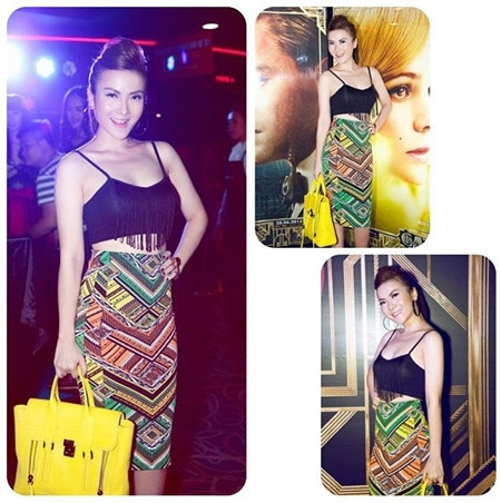 Chân váy bút chì họa tiết sôi động ngày hè được cô kết hợp với croptop lạ mắt cùng túi xách 3.1 Phillip Lim được rất nhiều quý cô ưa chuộng