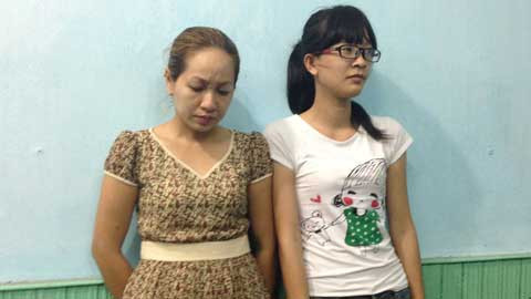 Các đối tượng Đông Phương và Thiên Lý (từ trái qua) tại cơ quan công an