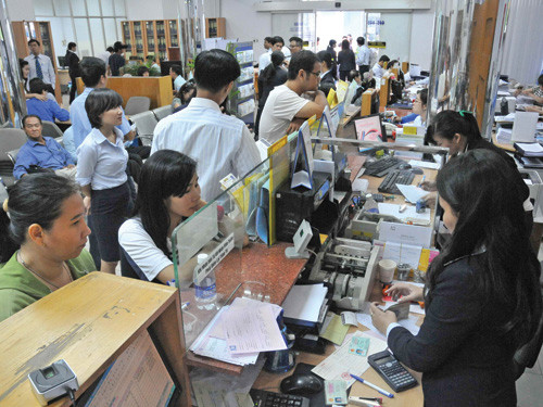 Phí chi trả kiều hối ở các NH quá cao sẽ là một trở ngại trong việc tăng thu hút dòng kiều hối vào hệ thống NH. Ảnh: Diệp Đức Minh. Phí chi trả kiều hối ở các NH quá cao sẽ là một trở ngại trong việc tăng thu hút dòng kiều hối vào hệ thống NH. Ảnh: Diệp Đức Minh