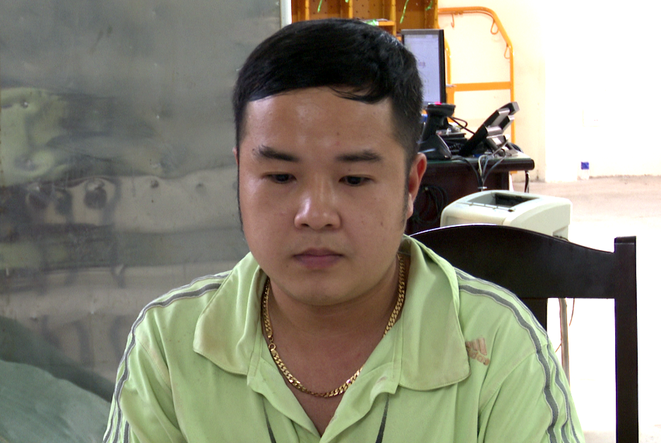 Đối tượng Lê Trần Thiện Đức tại cơ quan công an. Đối tượng Lê Trần Thiện Đức tại cơ quan công an.