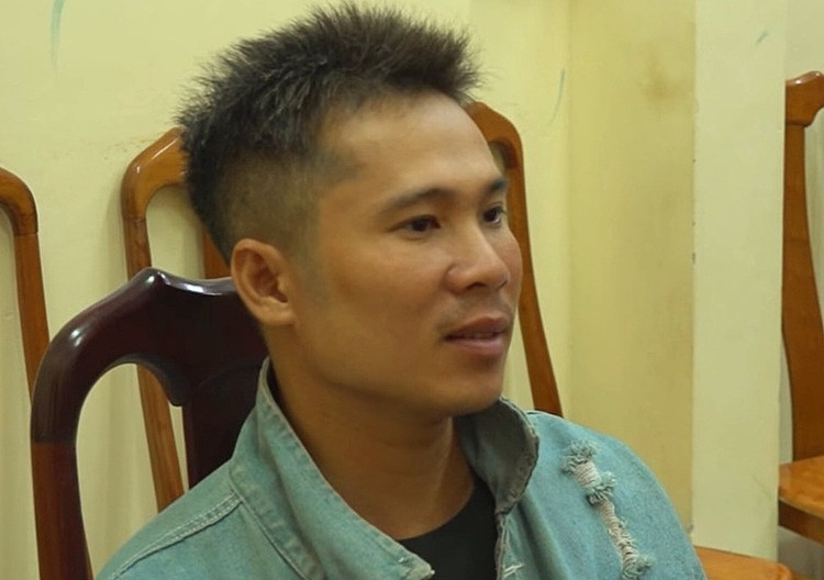 Trương Văn Đấu tại cơ quan công an.