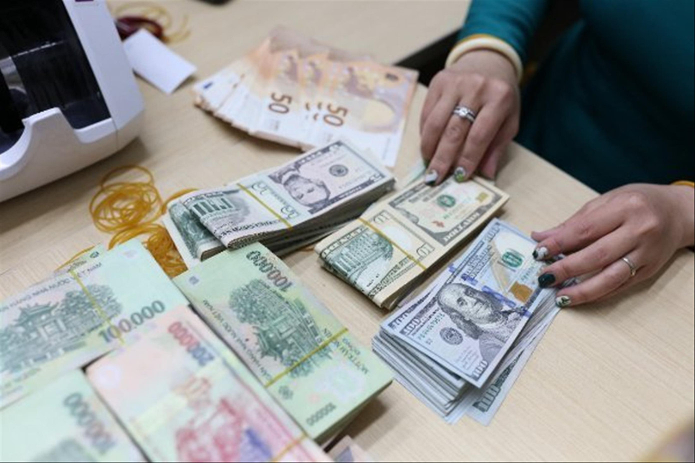 Tỷ giá tăng có lợi ngắn hạn cho doanh nghiệp xuất khẩu Ảnh: Như Ý