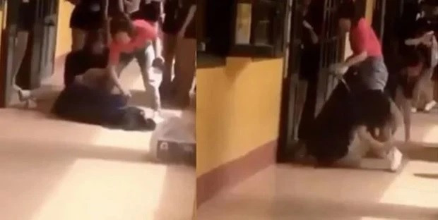 Cô giáo kéo lê học sinh (Ảnh cắt từ Clip) Cô giáo kéo lê học sinh (Ảnh cắt từ Clip)