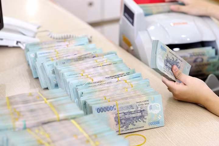 Ngân hàng hút tiền về để ổn định tỷ giá.