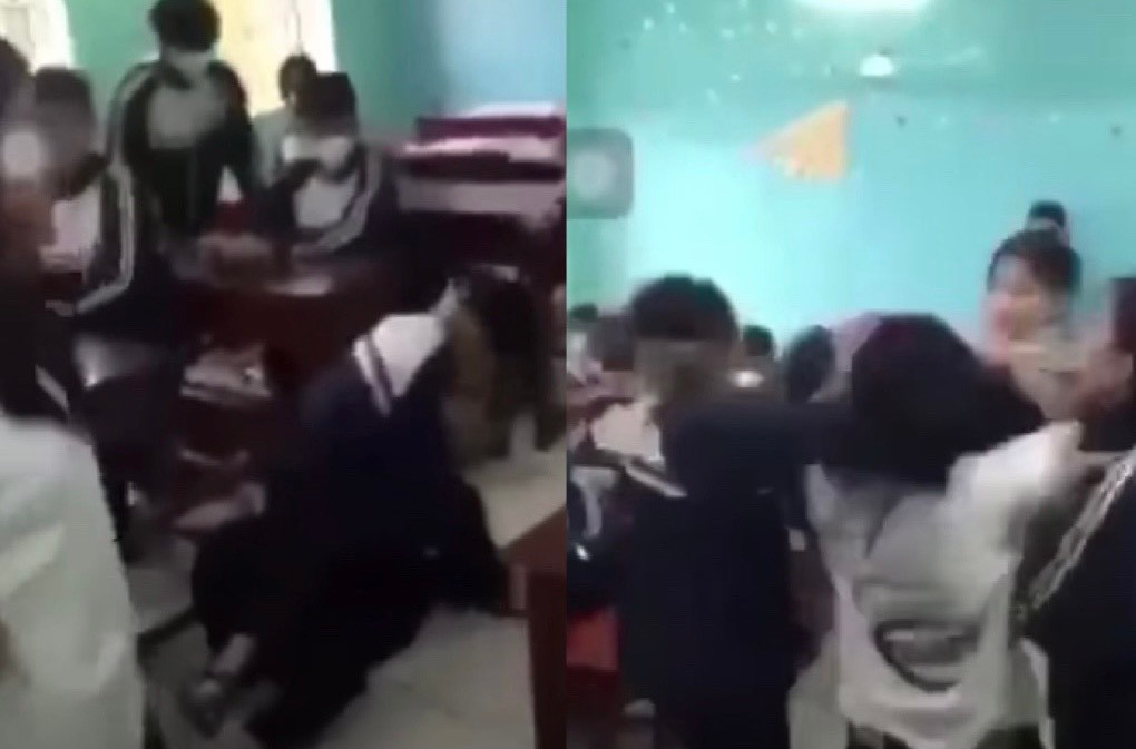 Cảnh nữ sinh bị nhóm bạn đánh tới tấp trong lớp. (Ảnh cắt từ clip).