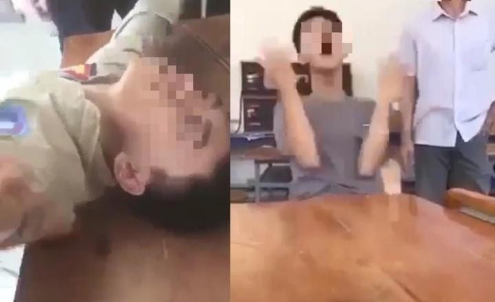 Hai nam sinh co giật trong lớp học sau khi hút thuốc lá điện tử (Ảnh cắt từ clip)