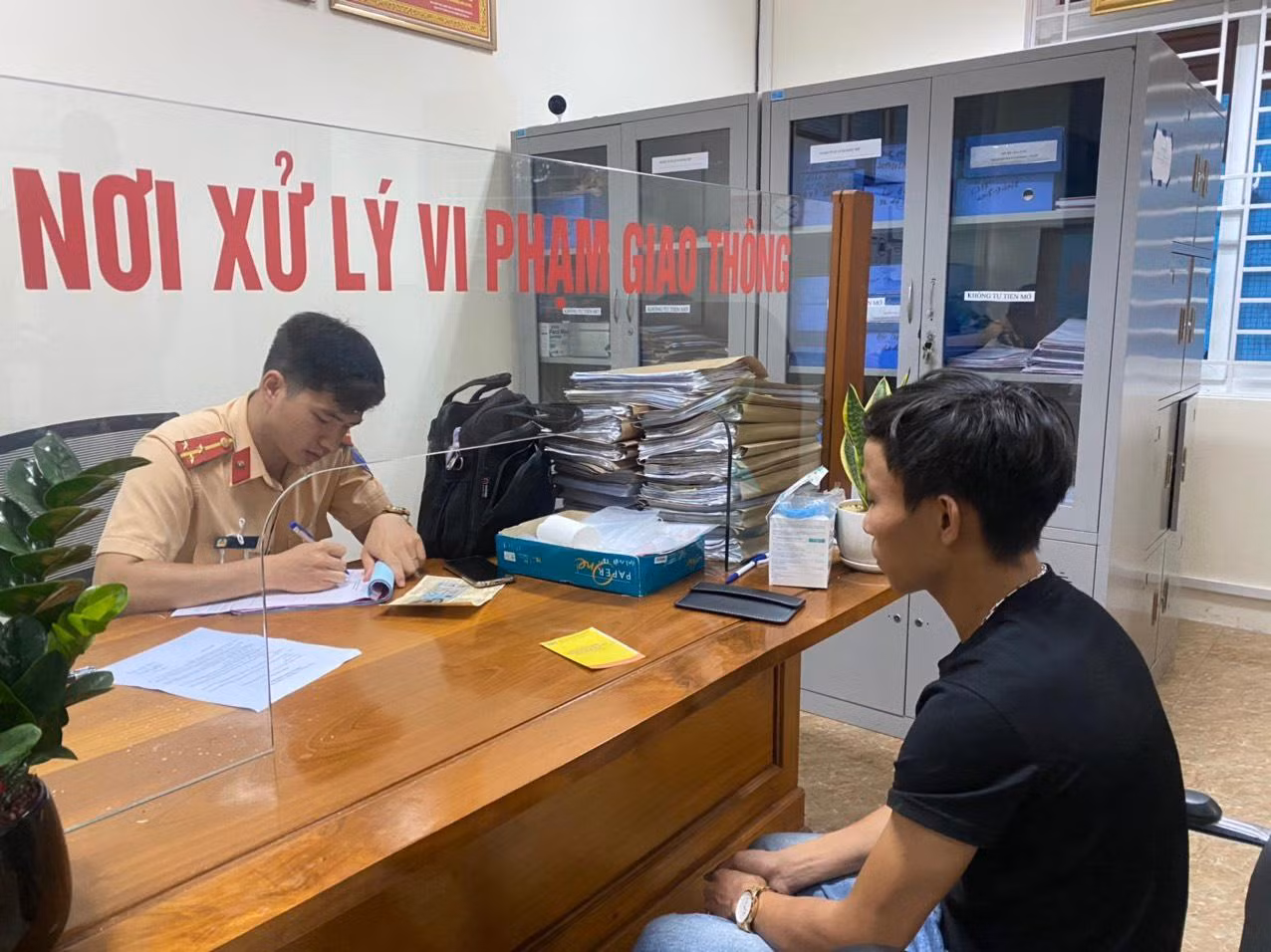Tài xế Quốc làm việc tại cơ quan công an.