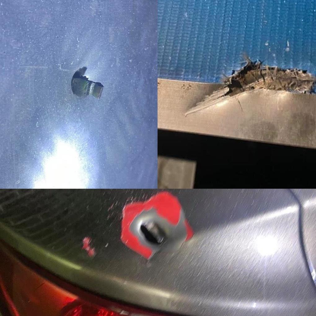 Những mảnh kim loại găm vào thành xe, bờ rào nhà dân. Những mảnh kim loại găm vào thành xe, bờ rào nhà dân.