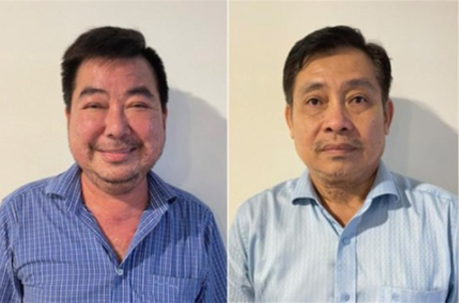 Bị can Lê Quang Bình và Võ Truyền Thống (trái qua phải).