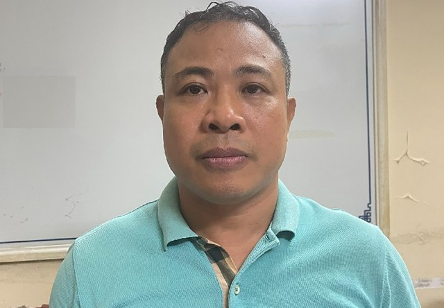 Đối tượng Nghiêm Quang Minh.