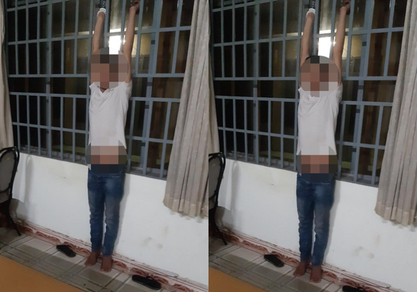 Bị hại bị còng tay treo lên cao. Ảnh: Người nhà cung cấp. Bị hại bị còng tay treo lên cao. Ảnh: Người nhà cung cấp.