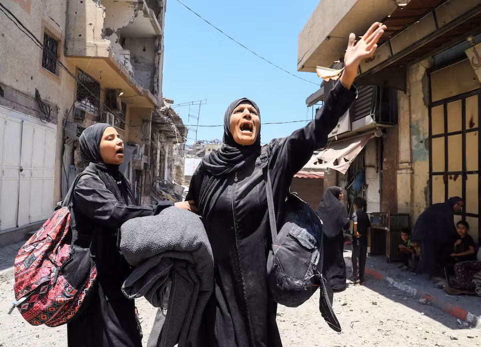 Một phụ nữ Palestine phản ứng sau cuộc không kích của Israel vào một ngôi nhà ở thành phố Gaza, ngày 30/5/2025. Ảnh: Reuters.