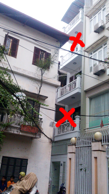 Ngôi nhà bốn tầng - nơi xảy ra vụ án mạng kinh hoàng. Ảnh: TN