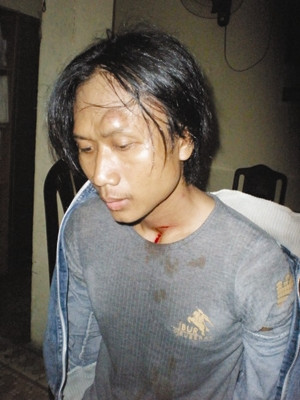 Hung thủ Cao Quốc Huy sau khi bị bắt giữ