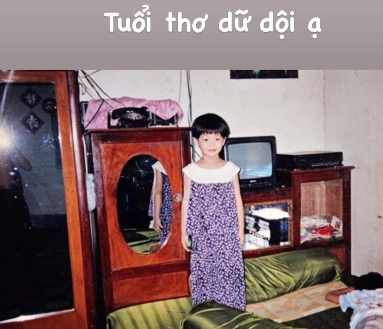 Á hậu Diễm Trang ngày bé với mái tóc tém đáng yêu.