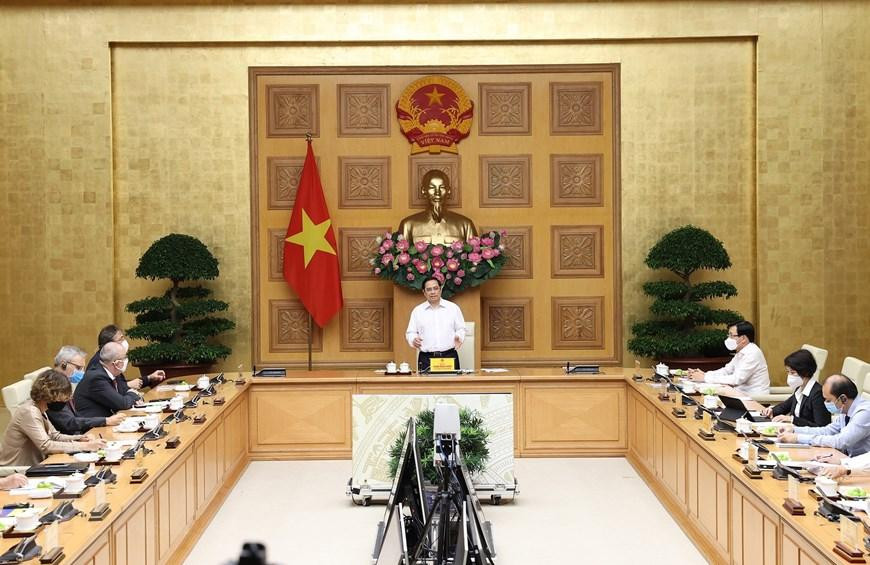 Quang cảnh buổi làm việc giữa Thủ tướng Phạm Minh Chính và các doanh nghiệp châu Âu tại Việt Nam. (Ảnh: Dương Giang/TTXVN)